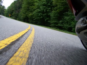I like this photo too, probably because of the yellow line.  Amy really had to hang off of the bike to capture these.