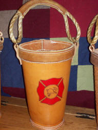 large leather fire bucket with image fire gear repair